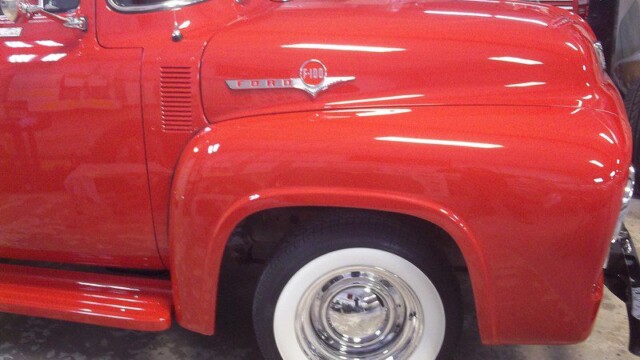 Red Ford F-100 classic truck.