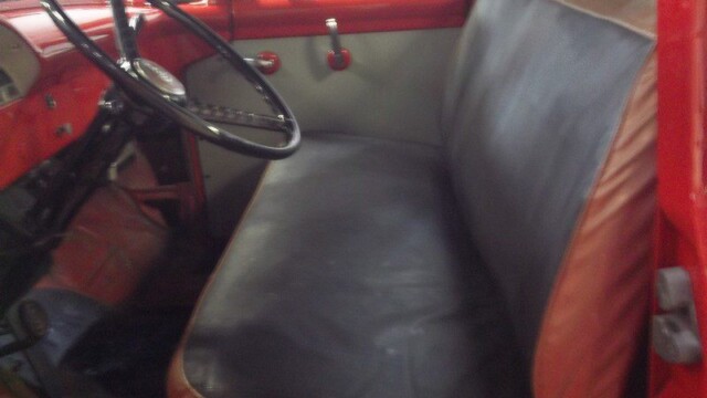 Red vintage truck's interior seat.
