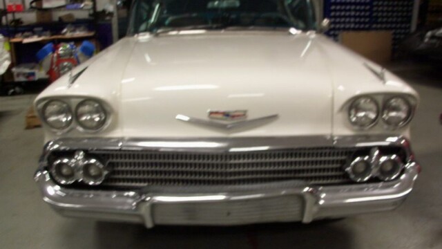 Classic white Chevrolet Biscayne car.
