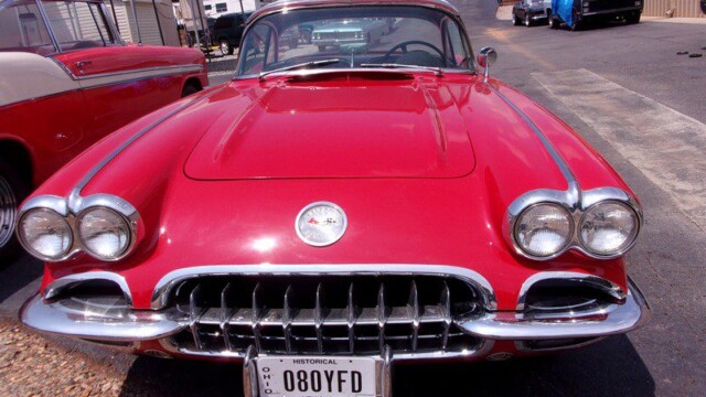 Red Corvette classic car front view.