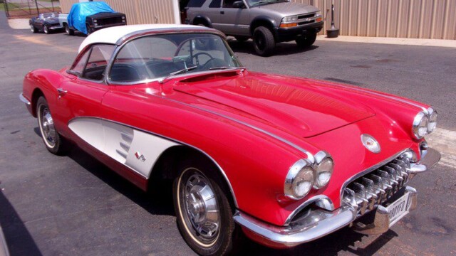 Red 1958 Chevrolet Corvette convertible.