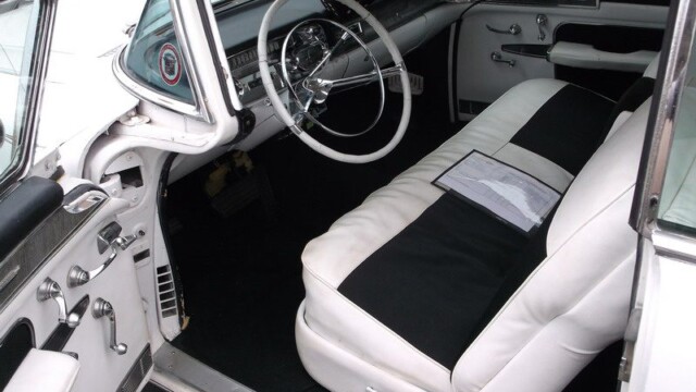 Classic car's white and black interior.