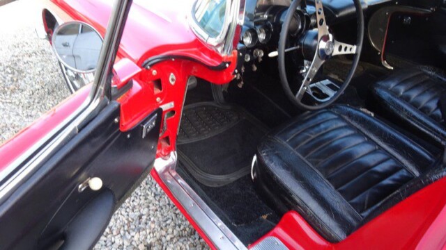 Red classic Corvette car interior.