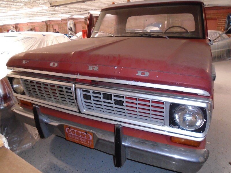 Red Ford F-Series pickup truck.