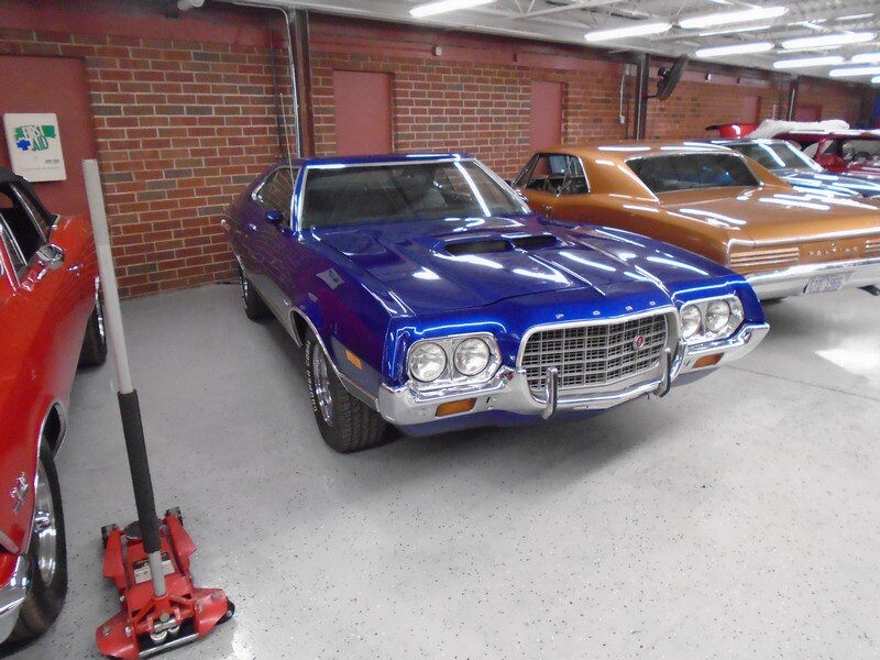 Front grille view of classic blue Torino