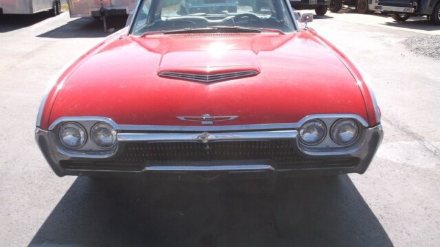 Red Ford Thunderbird classic car front.