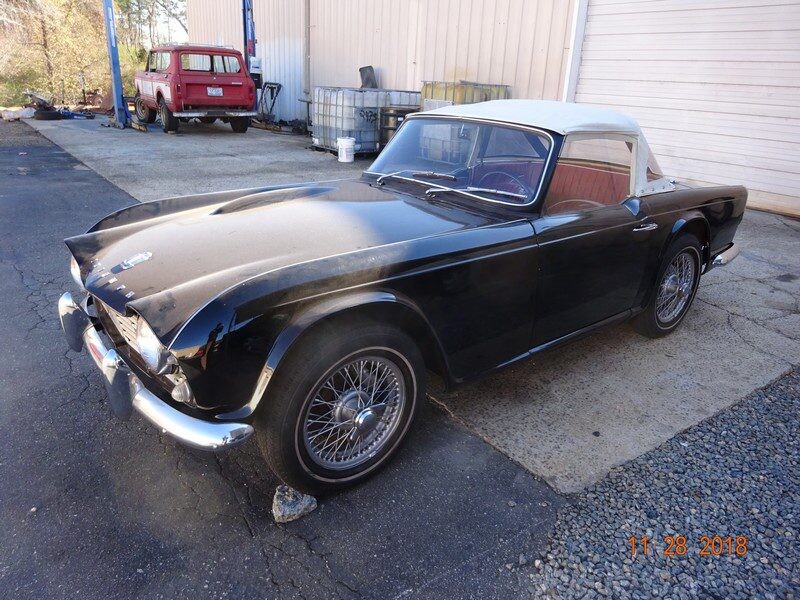 Black Triumph TR3 convertible for sale.