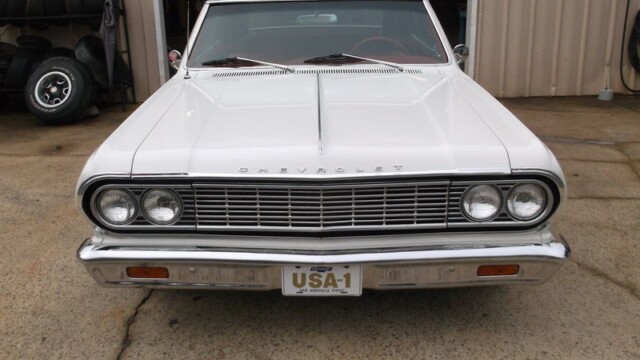 White classic Chevrolet convertible.