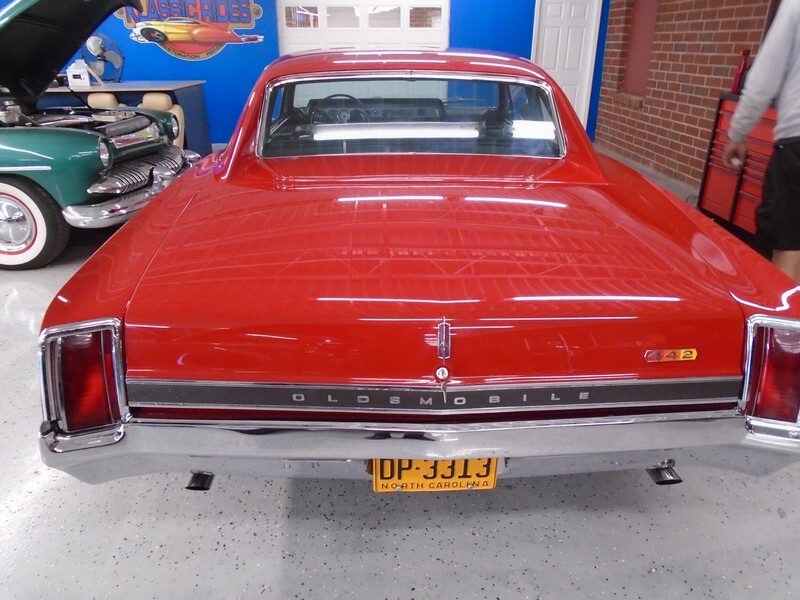 Red Oldsmobile 442 rear view.