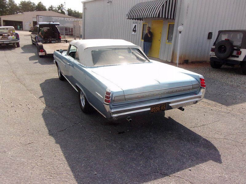 Light blue Pontiac Bonneville convertible.