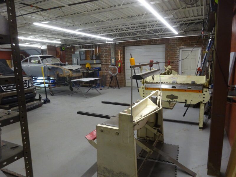 Auto body shop with metalworking tools.