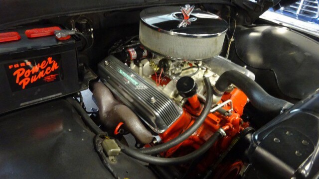 Polished air cleaner and orange painted engine