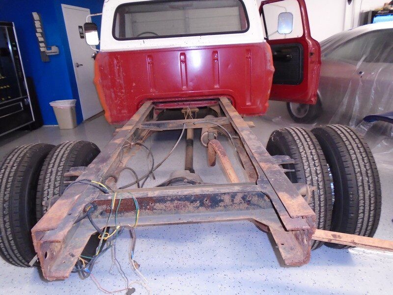 Rusty vintage truck chassis frame.