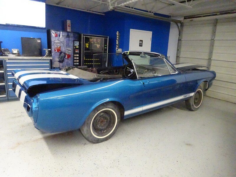 Blue Ford Mustang convertible restoration.
