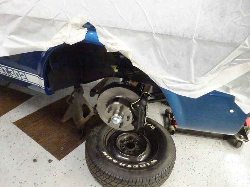 Blue Mustang's rear brake assembly.