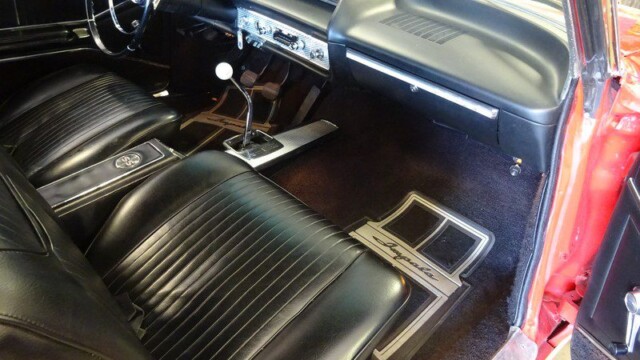 Classic car interior, black leather seats.
