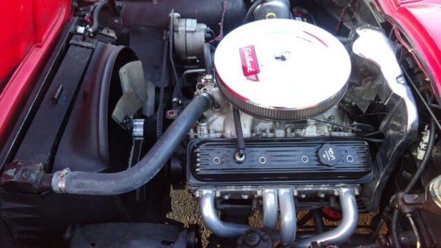 Red Corvette's Edelbrock engine bay.
