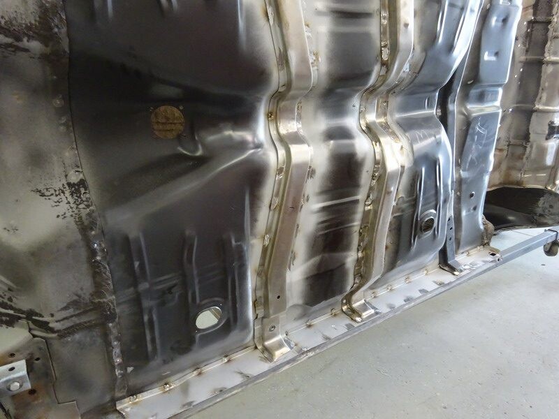 Car body panel repair in progress.