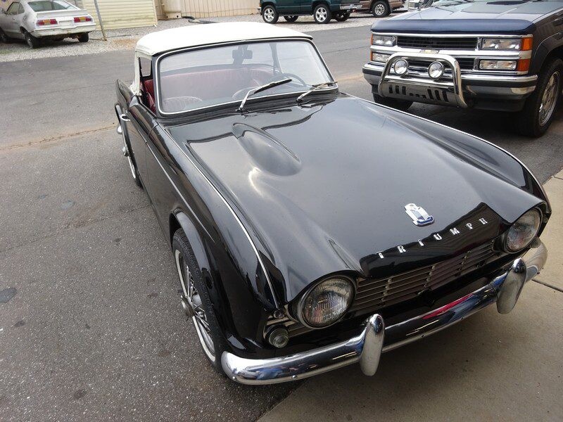 Black Triumph TR3 convertible classic car.