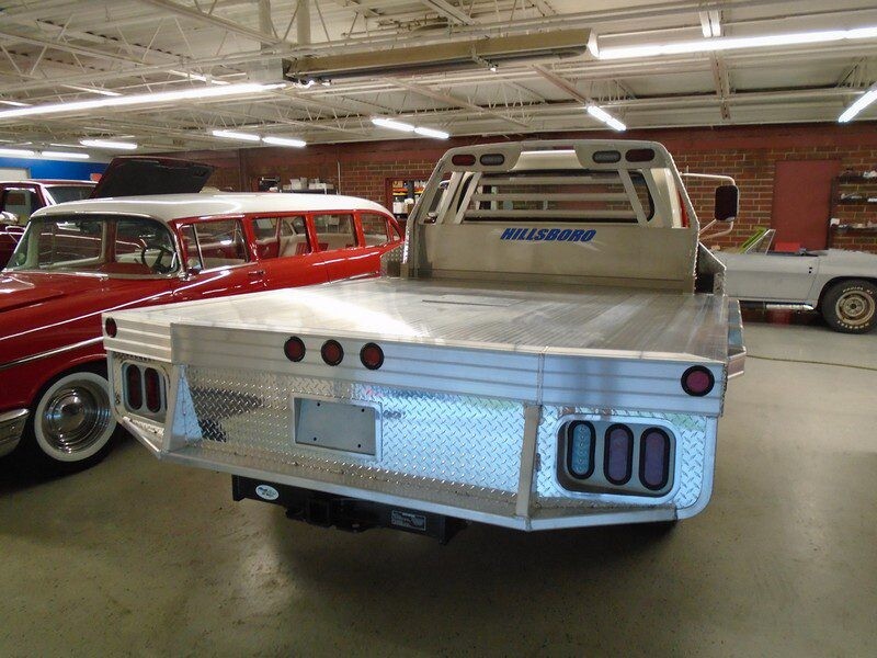 Aluminum flatbed truck rear view.