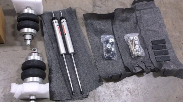 Air suspension kit with shocks and hardware.
