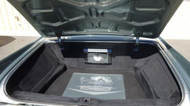 Cadillac trunk with custom interior.