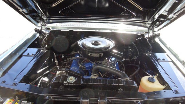 Gloss black bay with blue engine and fan