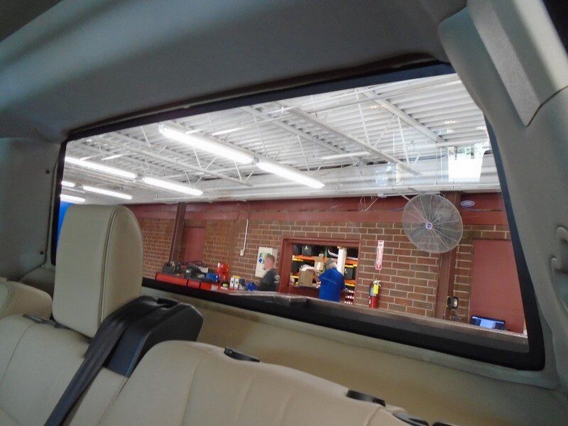Rear window view of a car interior.