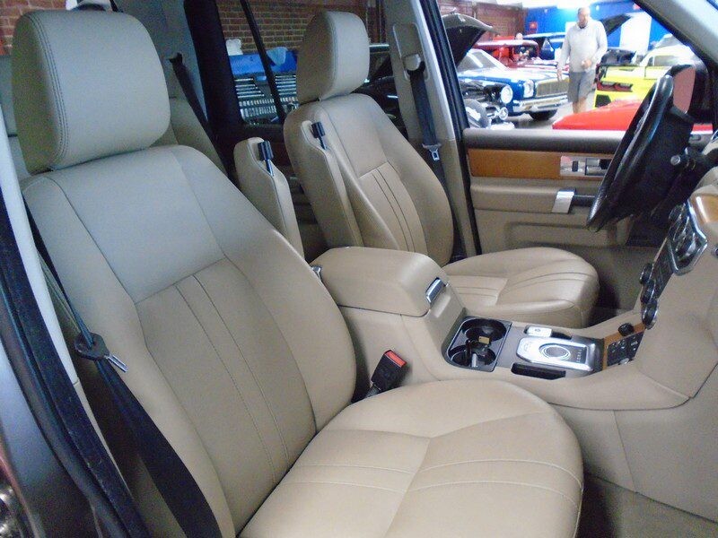 Beige leather interior of a Land Rover.