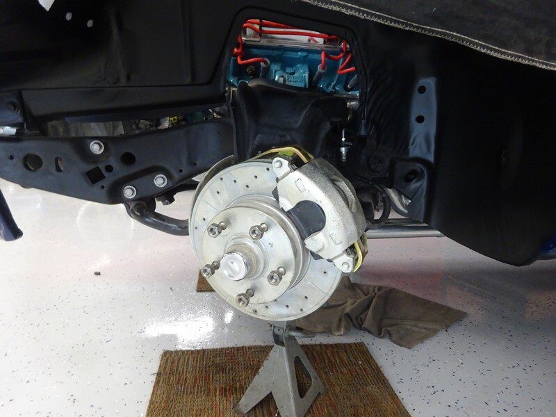 Car disc brake and caliper assembly.