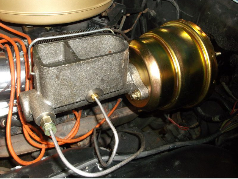 Car brake booster and master cylinder.