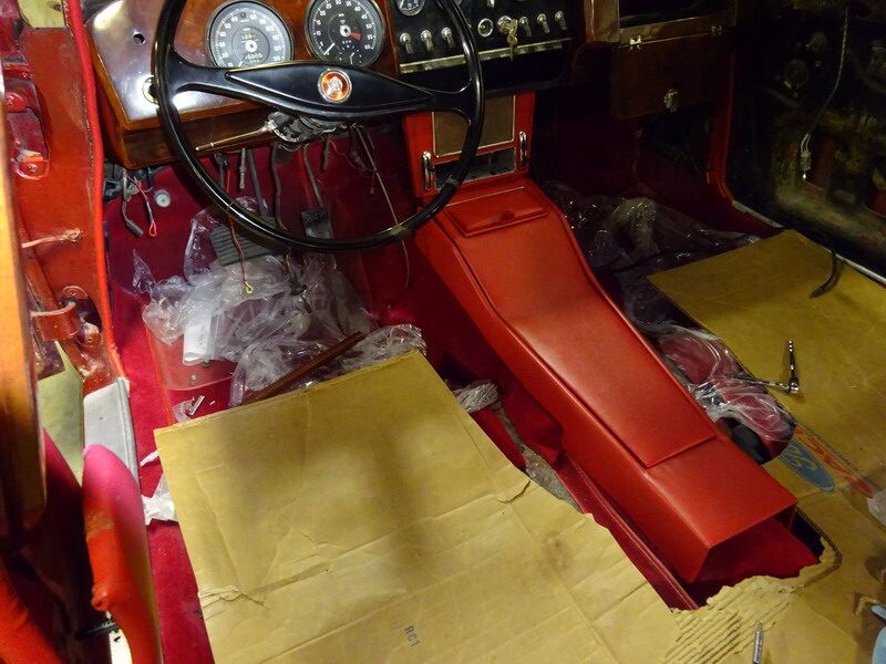 Red dashboard and center console with cardboard