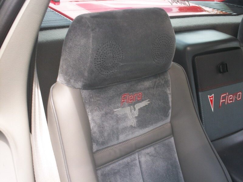 Pontiac Fiero gray velour seats.