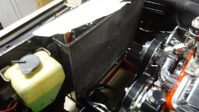 Car engine with new radiator installed.