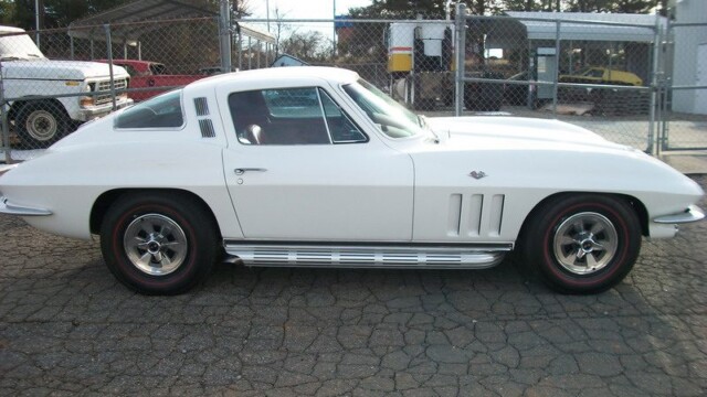 Side profile of classic Corvette with side pipes