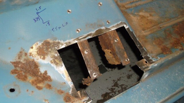 Rusty car floor panel repair.