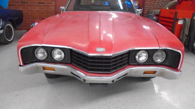 Red AMC Ambassador front view.
