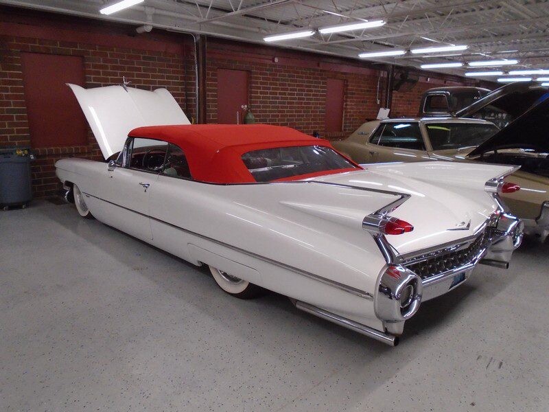 Classic 1959 Cadillac convertible with red soft top