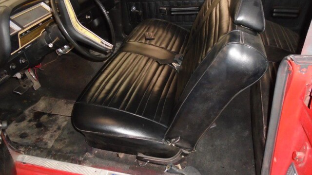 Red Ford Torino interior, driver's side.