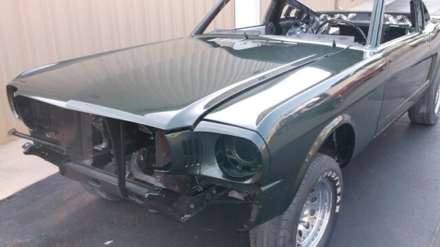 Dark green classic Mustang restoration.