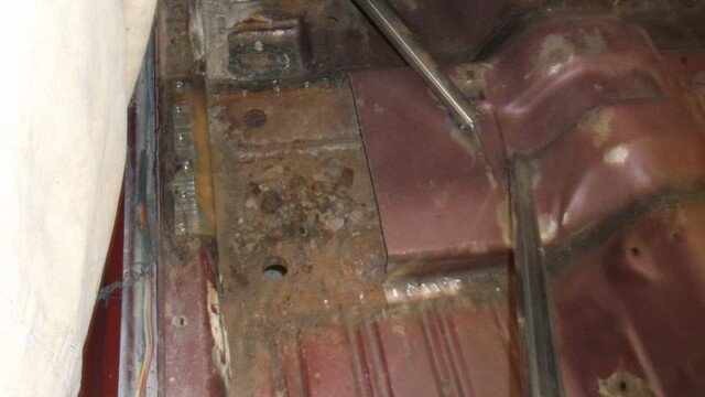Passenger floor pan with surface rust
