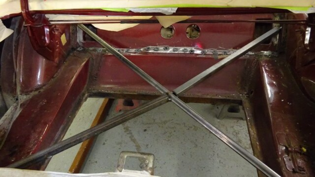 Car trunk restoration, metal bracing installed.