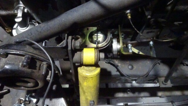 Yellow shock absorber and vehicle components.