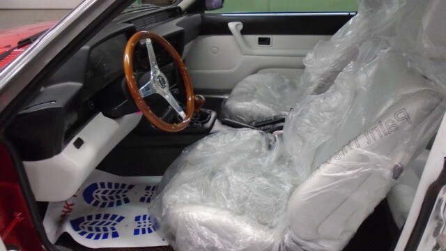BMW interior with plastic seat covers