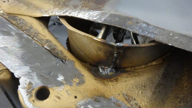 Welded metal car body repair.