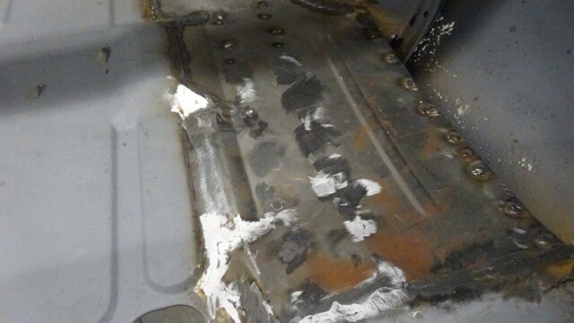 Spot welded wheelwell floor patch