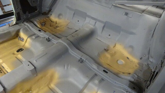 Car interior restoration, floor pan primed.