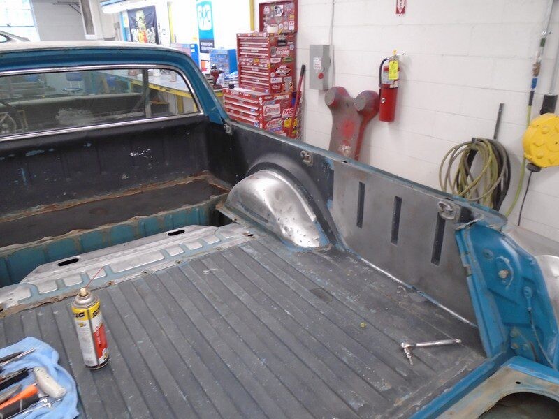 Classic car truck bed restoration in progress.
