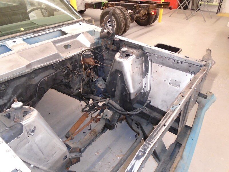 Classic car engine bay restoration.
