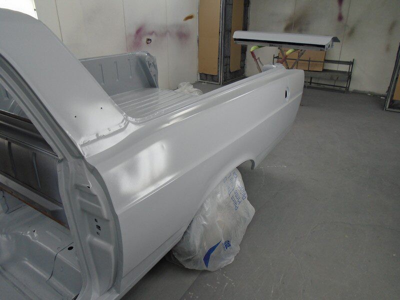 Primered Ford Falcon ute body shell.